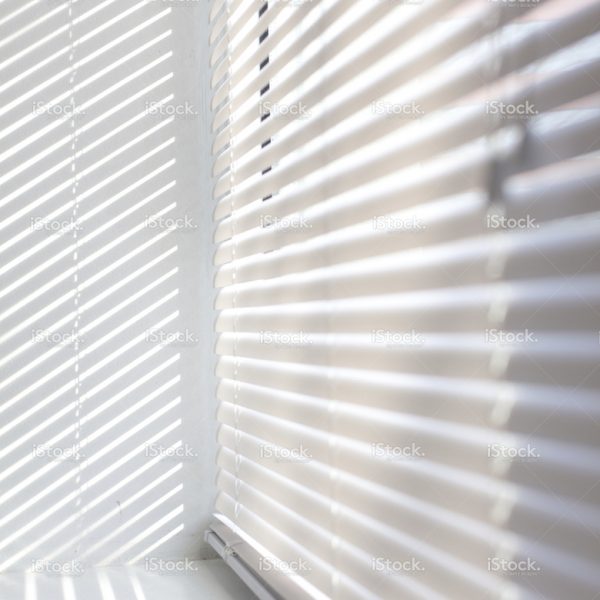 stock-photo-80184445-sunlight-coming-through-venetian-blinds-by-the-window