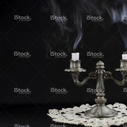stock-photo-92478095-old-silver-candlestick-with-unlit-candles
